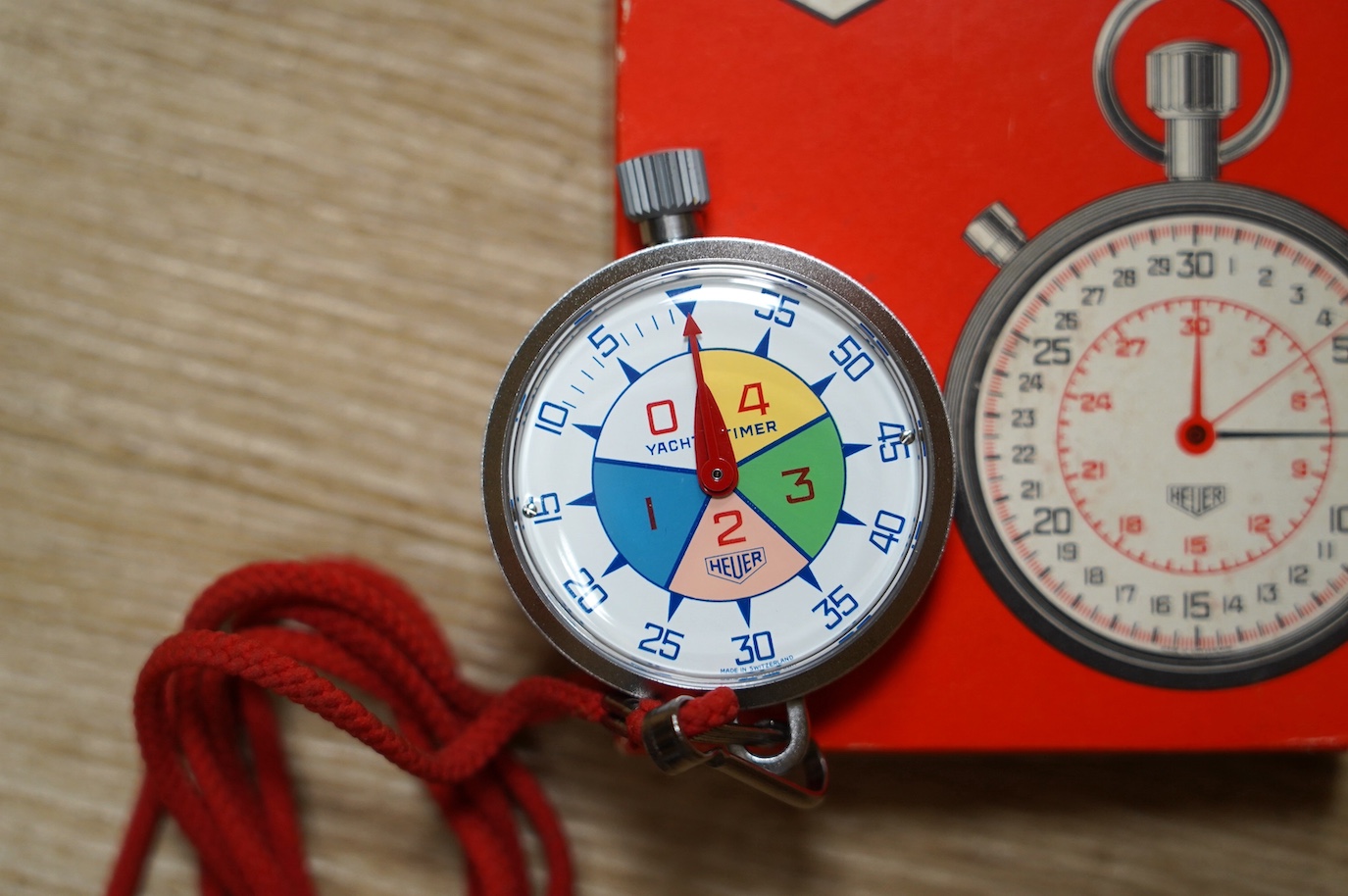 A 1960's chrome cased Heuer yacht timer, with polychrome dial, with associated box. Condition - good